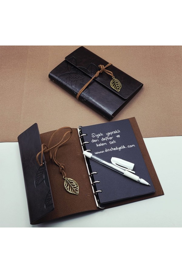 Beyaz Jel Kalem Ve Siyah Yapraklı Deri Hatıra Defteri Beyaz Jel Kalem Ve Siyah Yapraklı Deri Hatıra Defteri